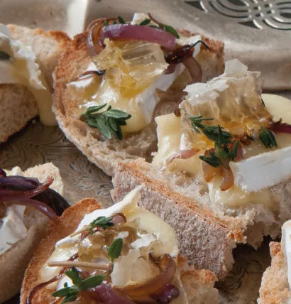 Cut Comb, Brie & Red Onion Canapes